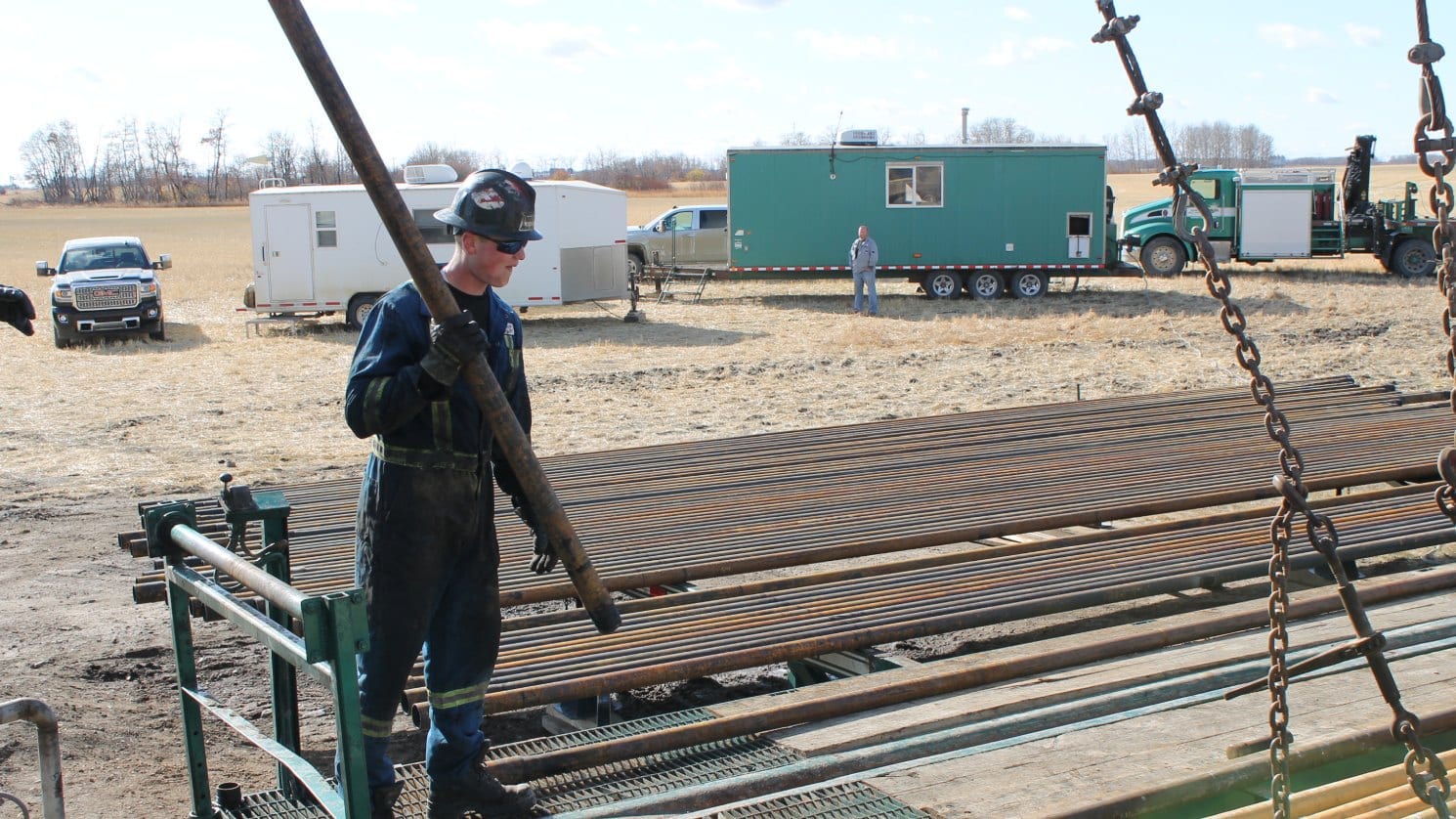 worker holding a metal worker holding a metal
